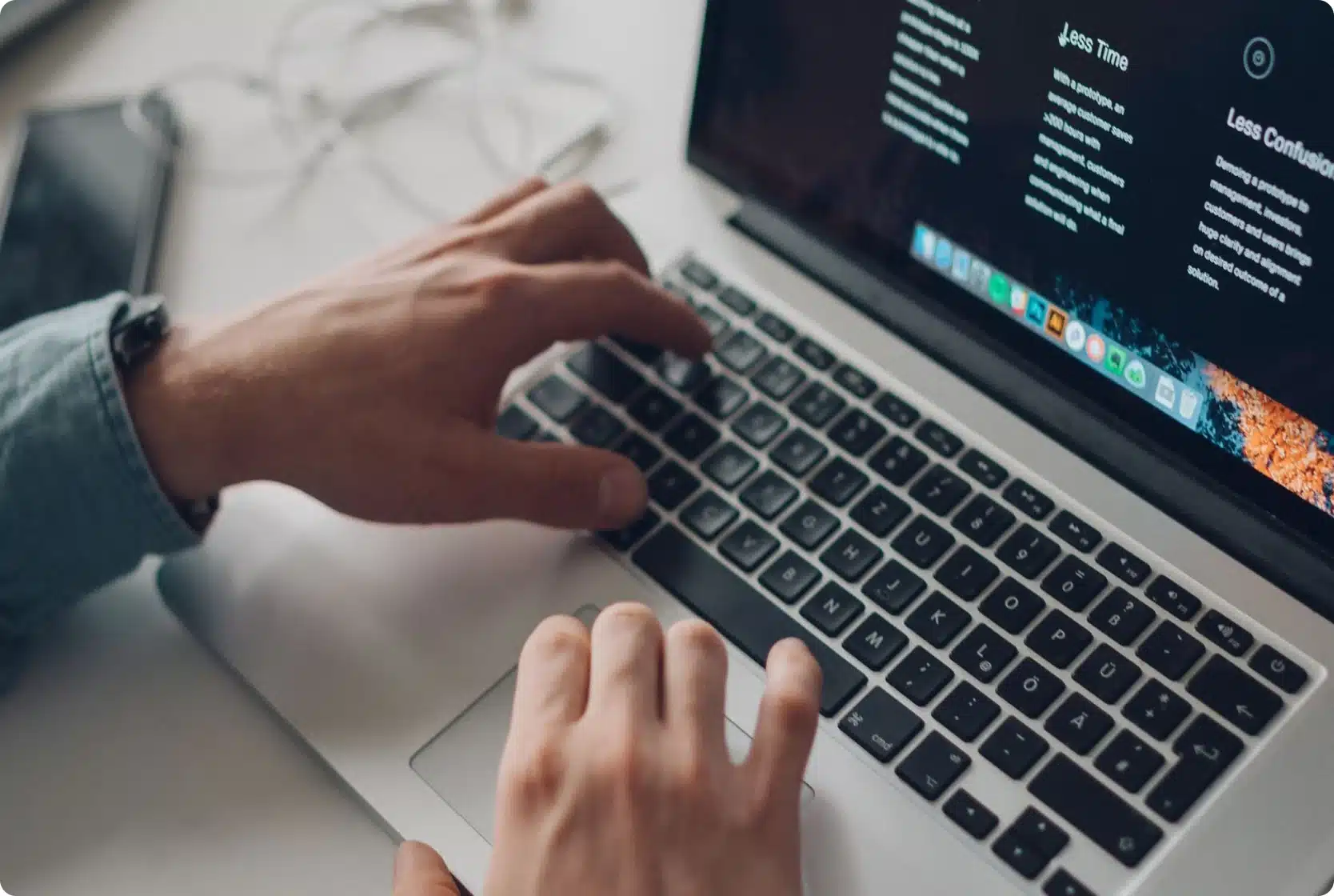 Person typing on laptop with financial dashboard overlay