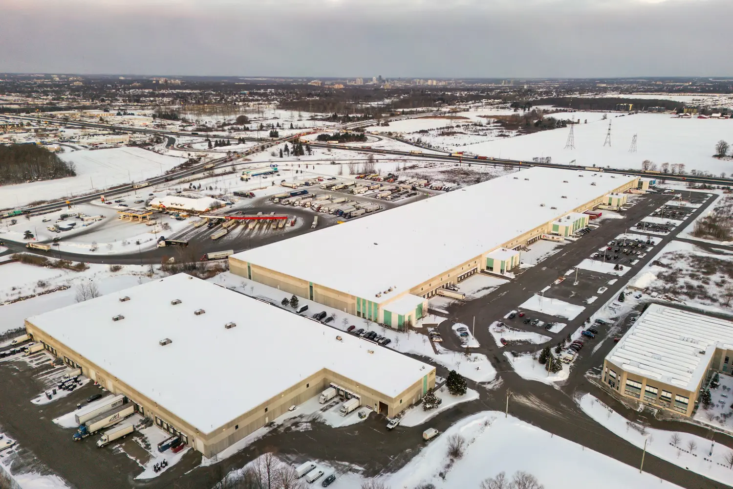 Aerial view of several warehouse buildings in winter