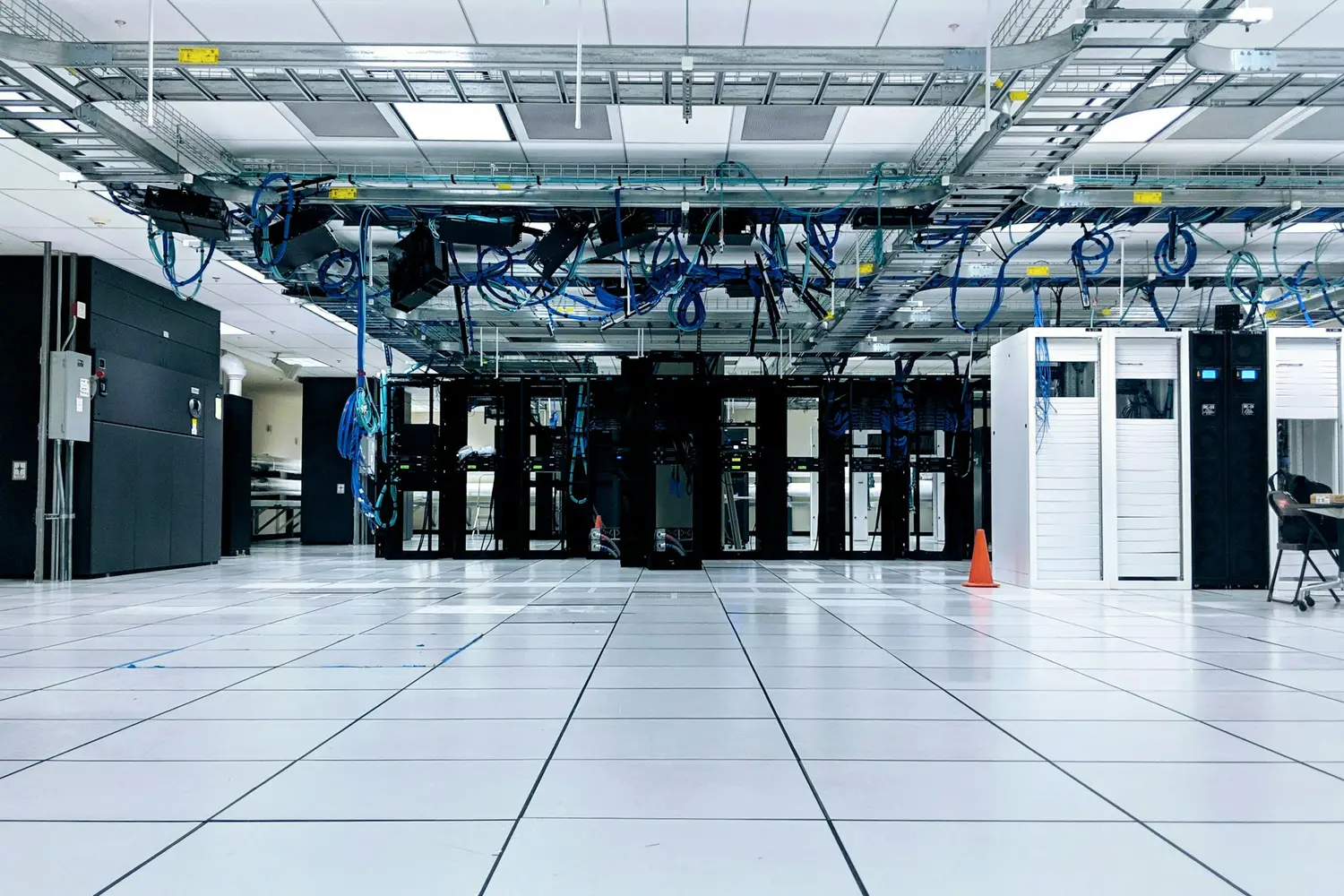 Server room with rows of network cabinets