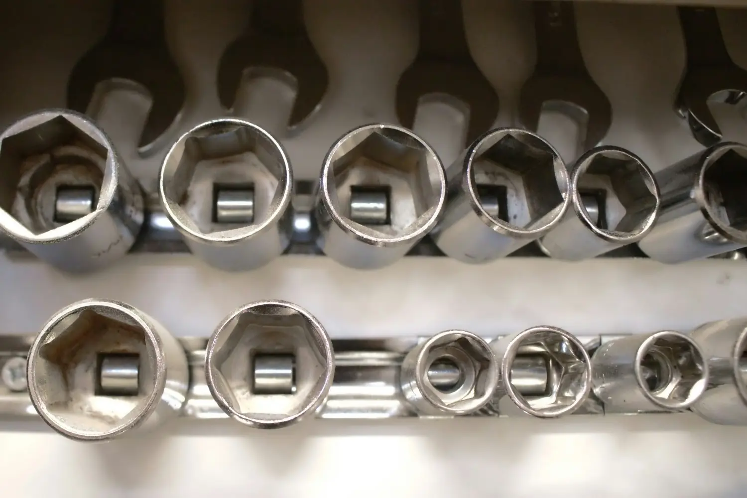Chrome socket wrench heads arranged in rows