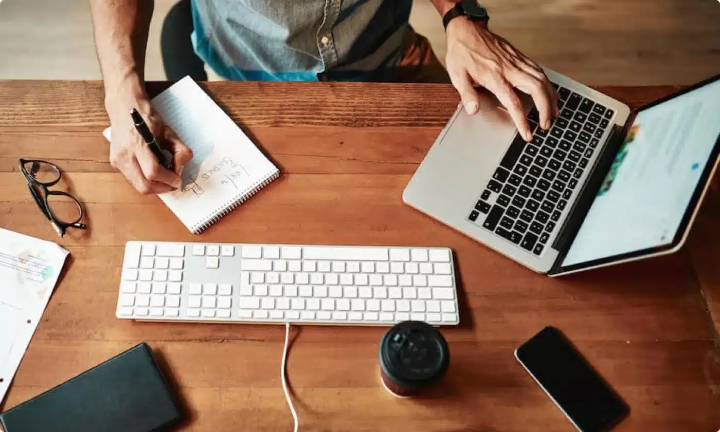 Business professional working on laptop at desk
