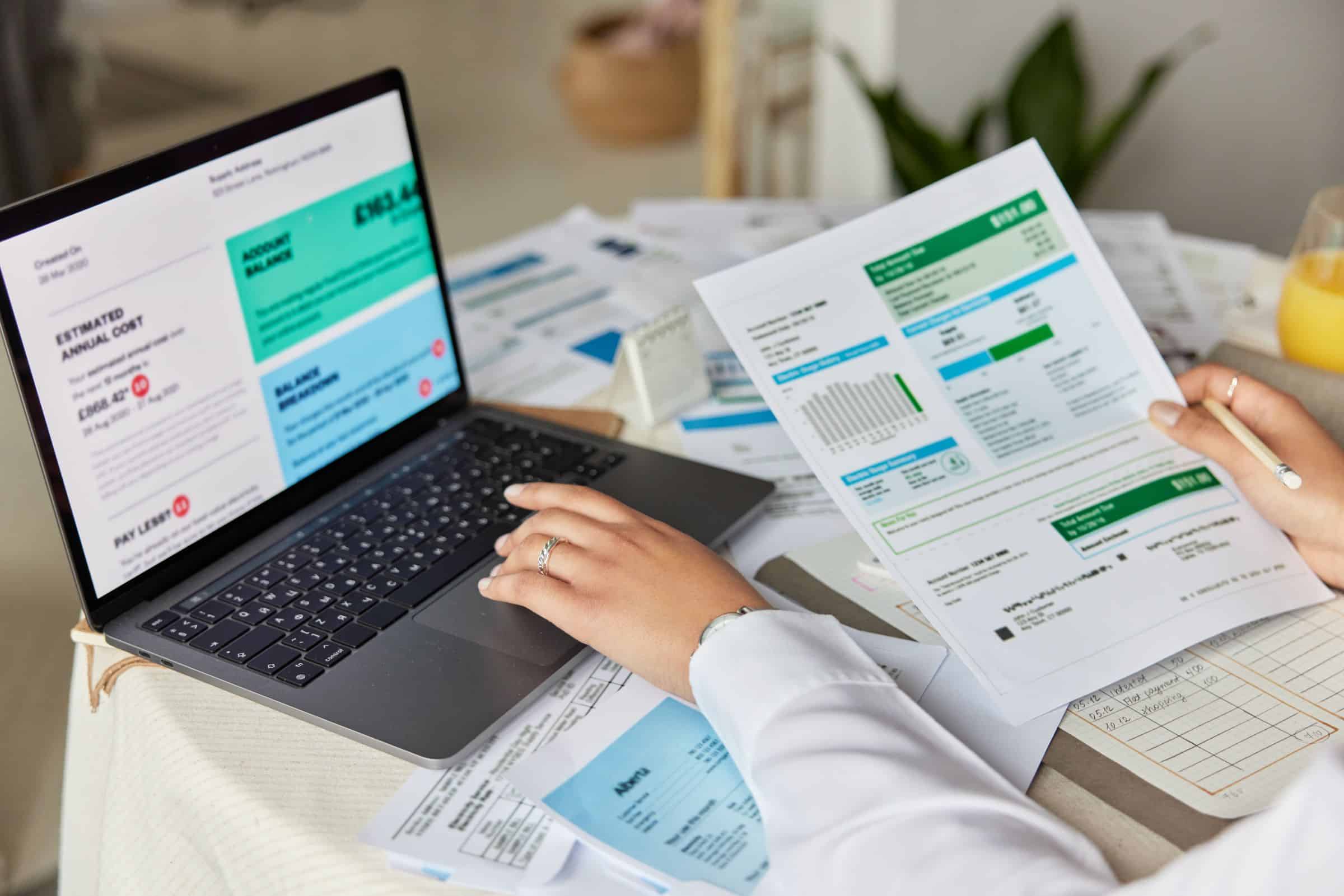 Accountant and bookkeeper reviewing an invoice together