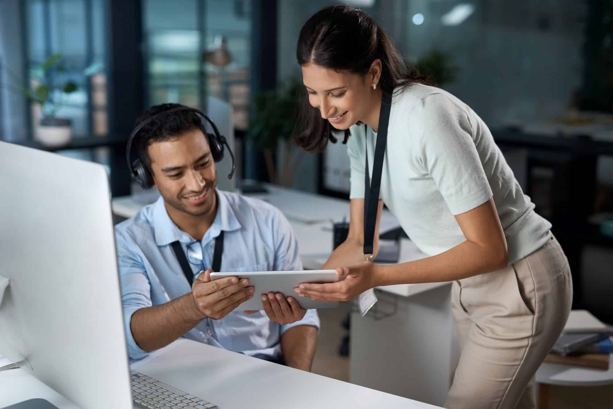 Young man and woman using a digital tablet together