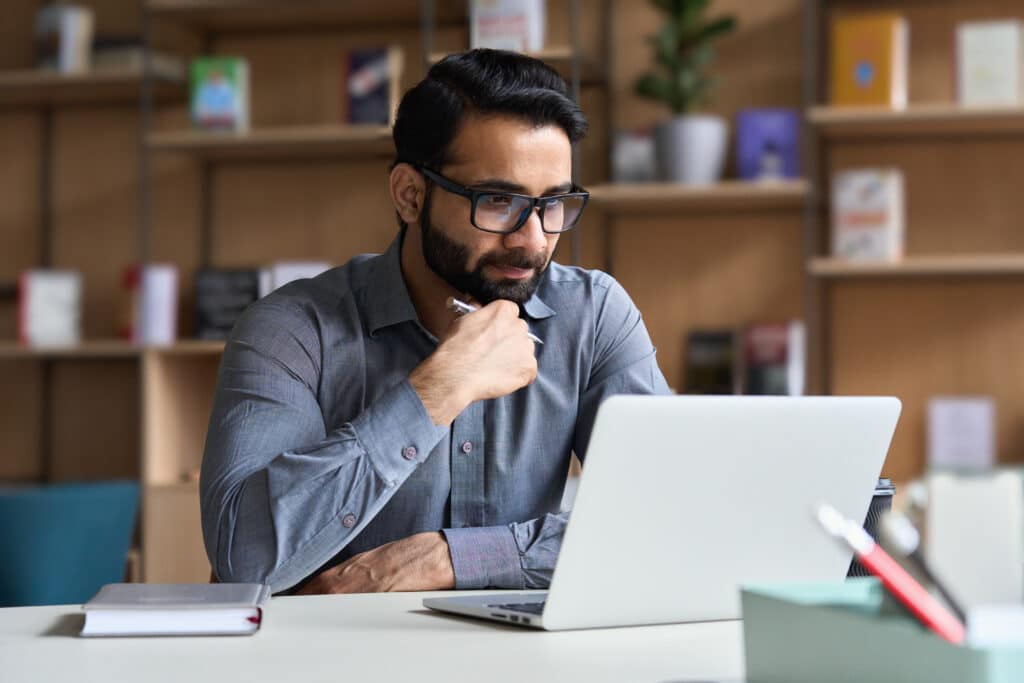 Person reviewing EDI change log documentation