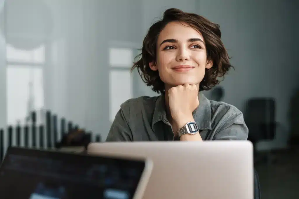 Smiling woman in office environment