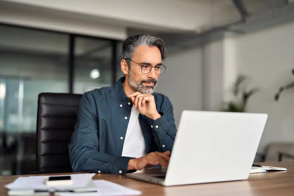 male professional using tradacoms edi computer portal