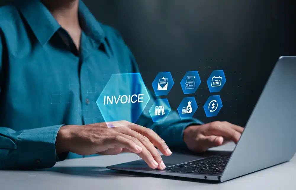man using retail edi portal for edi 810 invoice